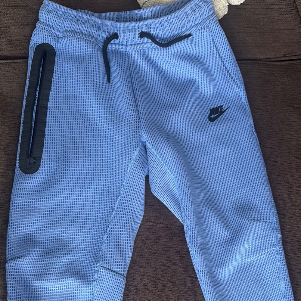 Nike Tech Blue Sweatpants with Tapered Fit and Ribbed Texture